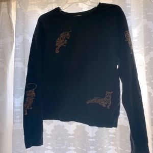 Anthropologie Black sweatshirt with tiger appliqués
